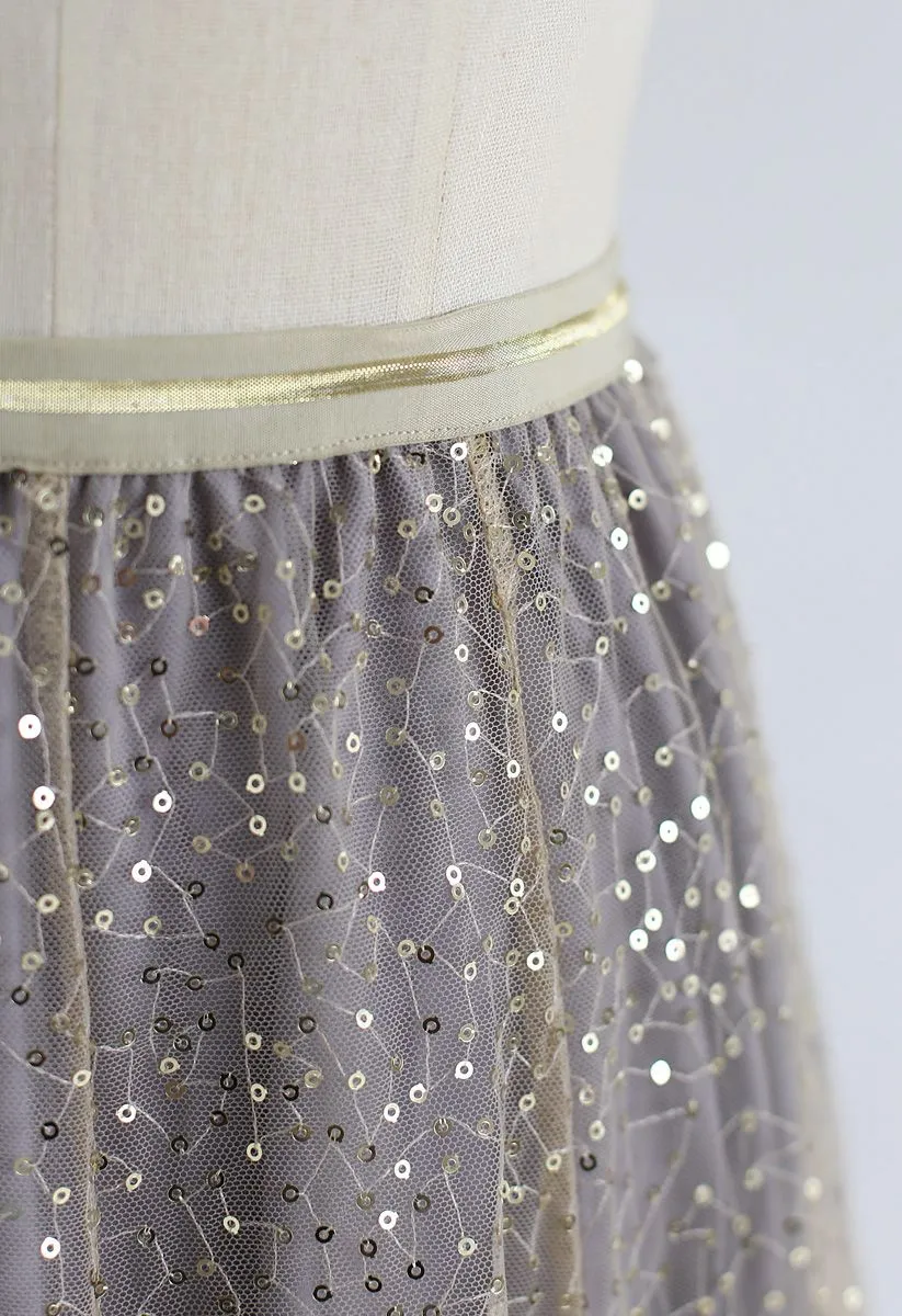 Jupe plissée en tulle brodé de sequins scintillants